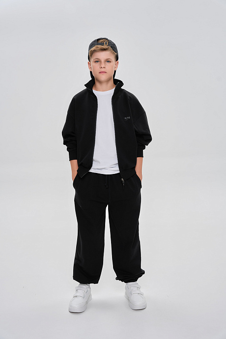 Костюм из футера объемного кроя